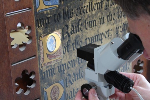 Peter Martindale using a stereo microscope at St Mark’s Pennington. Credit Paul Young.
