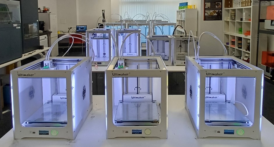 Rows of 3D printers at MMU