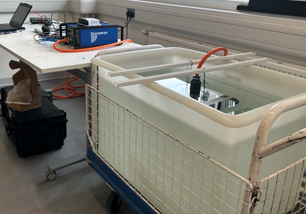 INNOMAR profiler sensor (in water), with top box and small white inertial measurement unit (IMU).