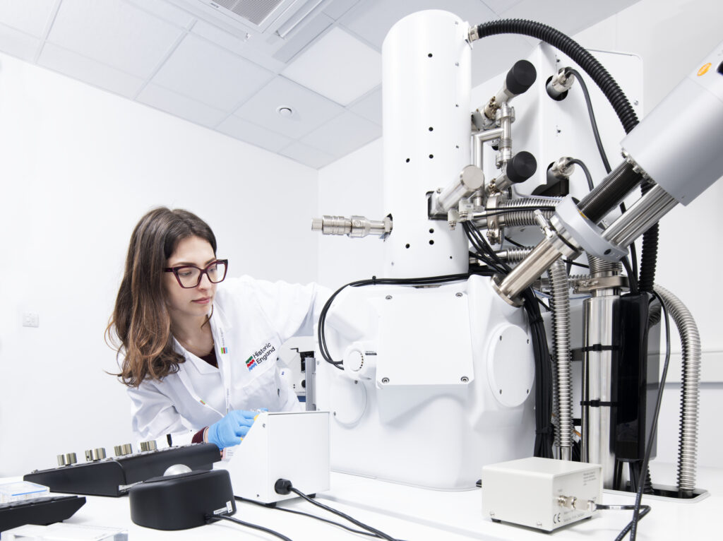 Irene Bargagli, Conservation and Heritage Science Technician at Historic England, operating the Scanning Electron Microscope.
The Scanning Electron Microscope has been purchased as part of the Creating a national integrated mobile and fixed lab for collections, historic buildings, and sites project as part of the Research Infrastructure for Conservation and Heritage Science (RICHeS) programme, funded by the UKRI Arts and Humanities Research Council through the UKRI Infrastructure Fund.