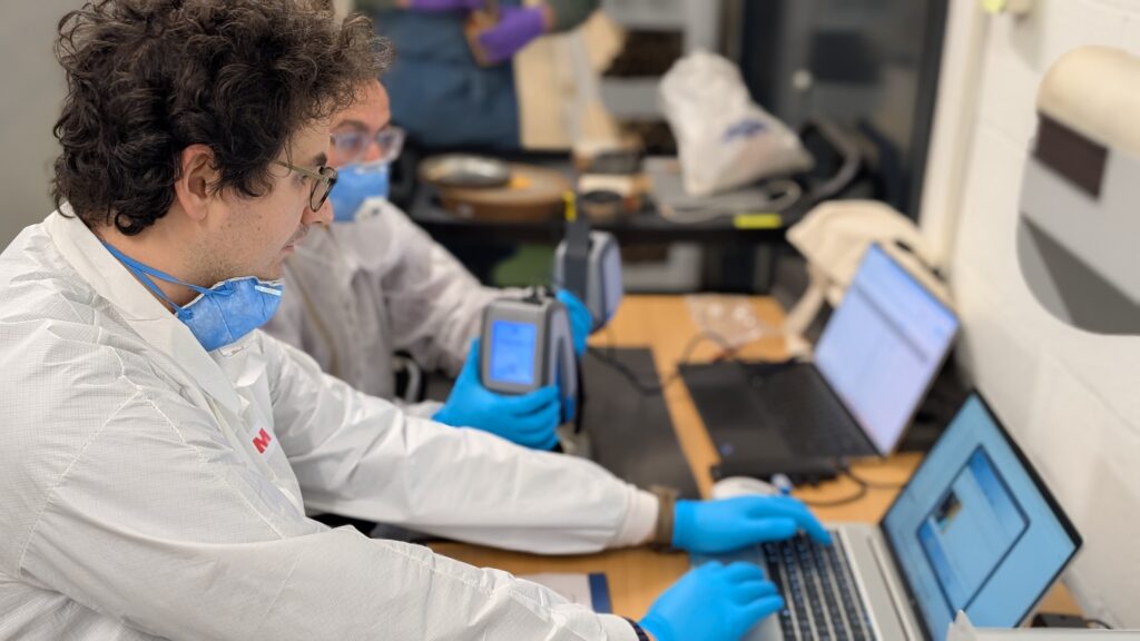 Researchers undertaking analysis.